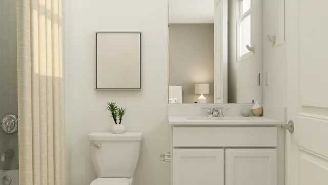a bathroom with a sink toilet and mirror