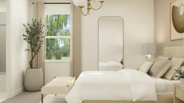 a bedroom with a bed and a mirror