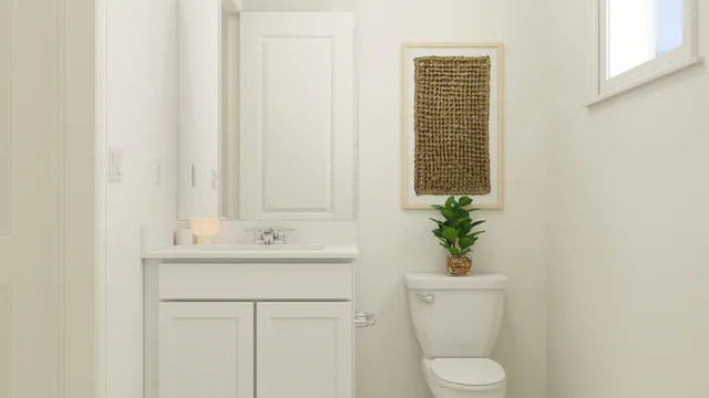 a bathroom with a sink a toilet and mirror