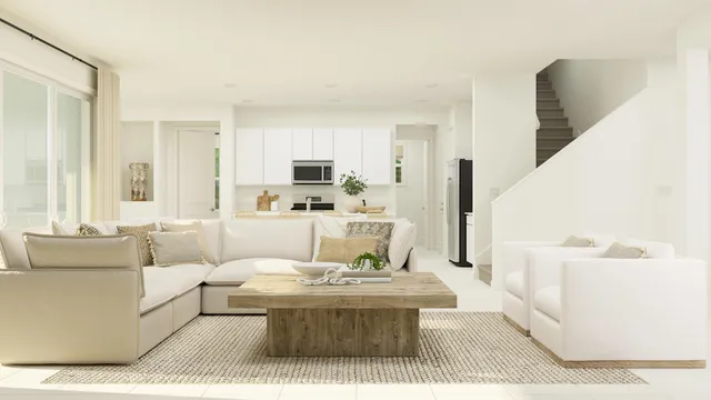 a living room with furniture and a table