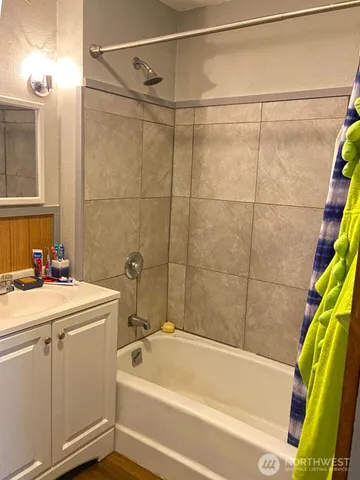 a bathroom with a sink and a bathtub