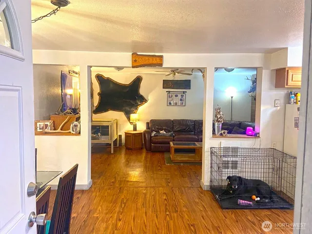 a living room with furniture and a table