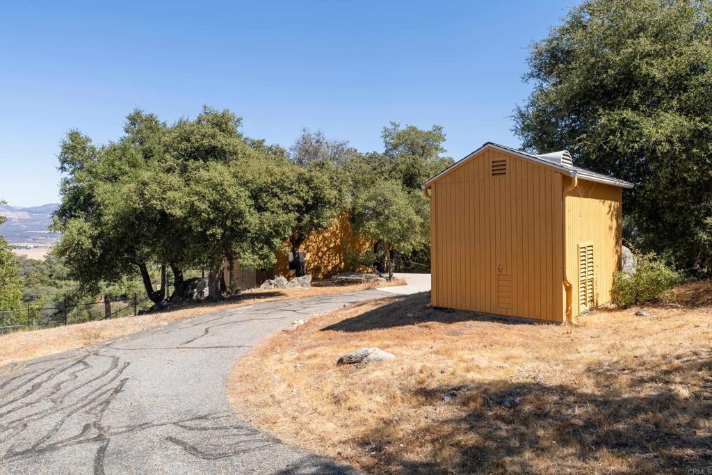 25770 East Grade Road Santa Ysabel, CA 92070 - Photo 40 of 75 a view of a house with a snow in the background