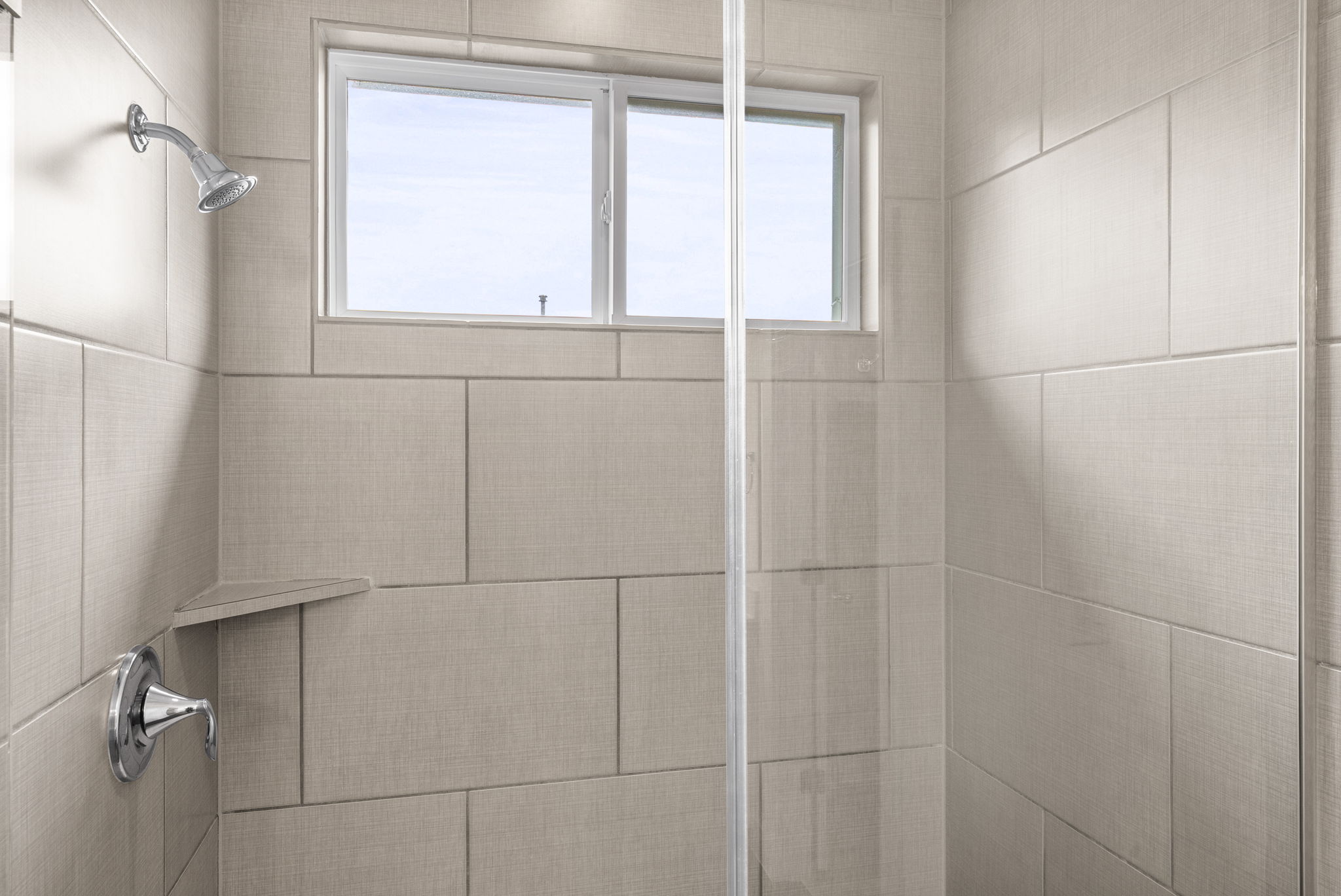 1501 Homespun Road Austin, TX 78745 - Photo 26 of 33 Bathroom view of a tile shower