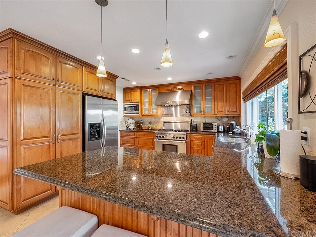 878 Prospect Place Costa Mesa, CA 92626 - Photo 15 of 47 Plenty of counter top space with granite counter tops and soft close drawers.