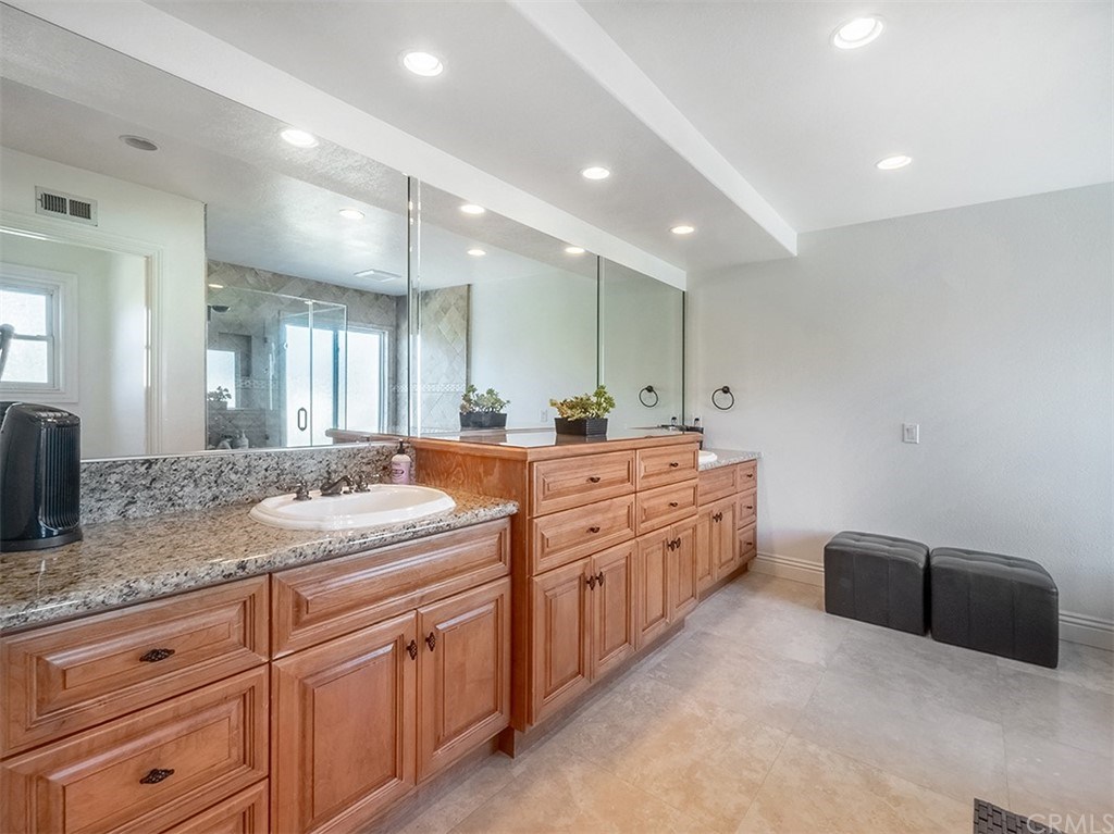 878 Prospect Place Costa Mesa, CA 92626 - Photo 34 of 47 Custom cabinets, dual sinks, vanity, tons of lighting!