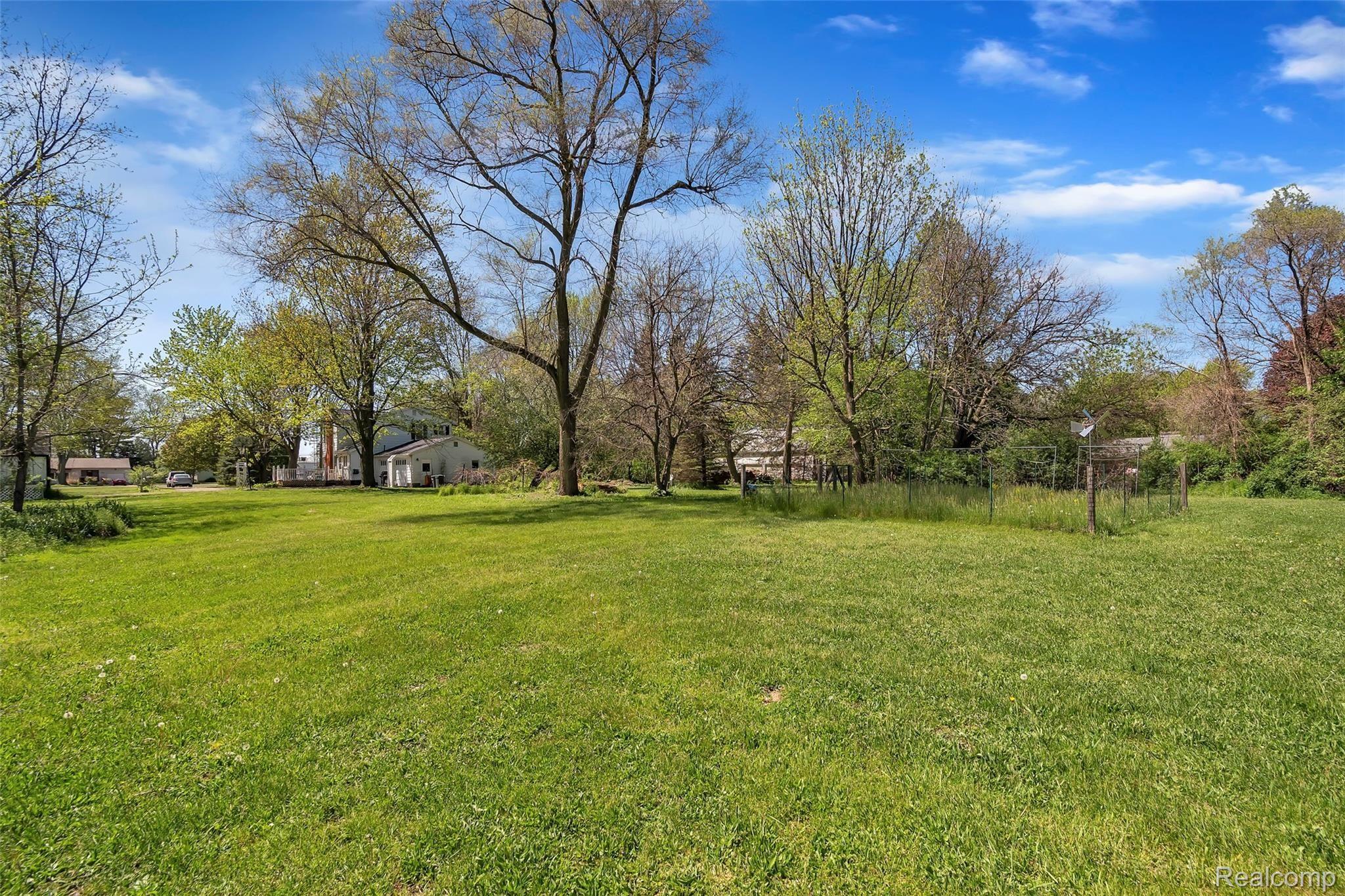 2074 Covert Road Burton, MI 48509 - Photo 27 of 28 Covert outside.jpg