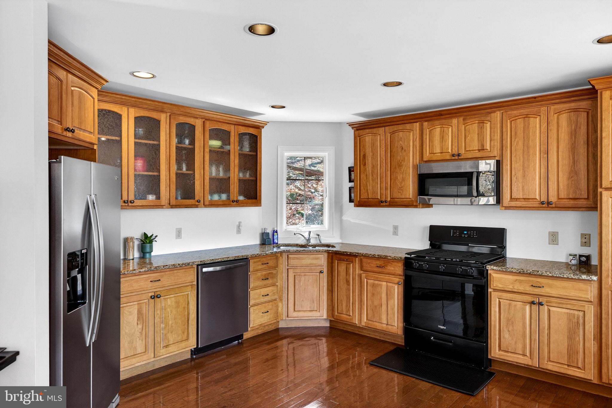 154 Kickapoo Drive Hazleton, PA 18202 - Photo 23 of 87 Warm wood tones in a bright kitchen.