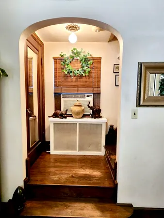 a room with a bed and a window