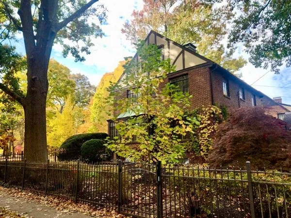 a backyard of a house with lots of green space