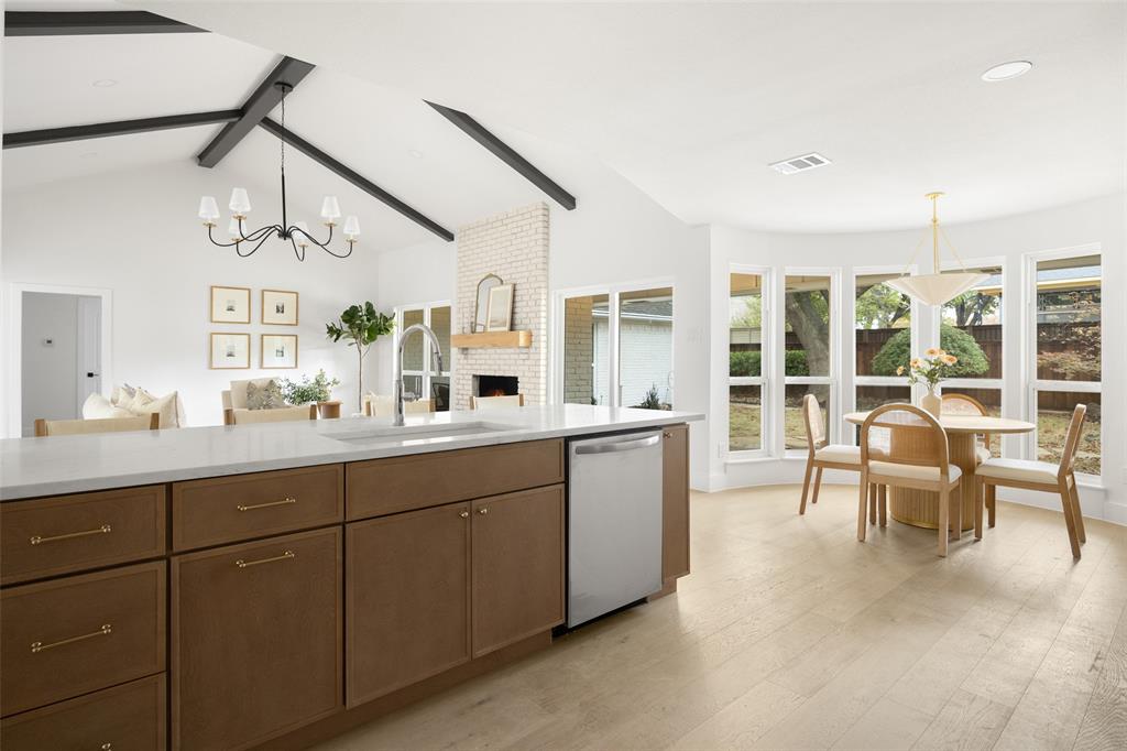 16805 Deer Park Drive Dallas, TX 75248 - Photo 14 of 39 a spacious bathroom with a double vanity sink and a large mirror