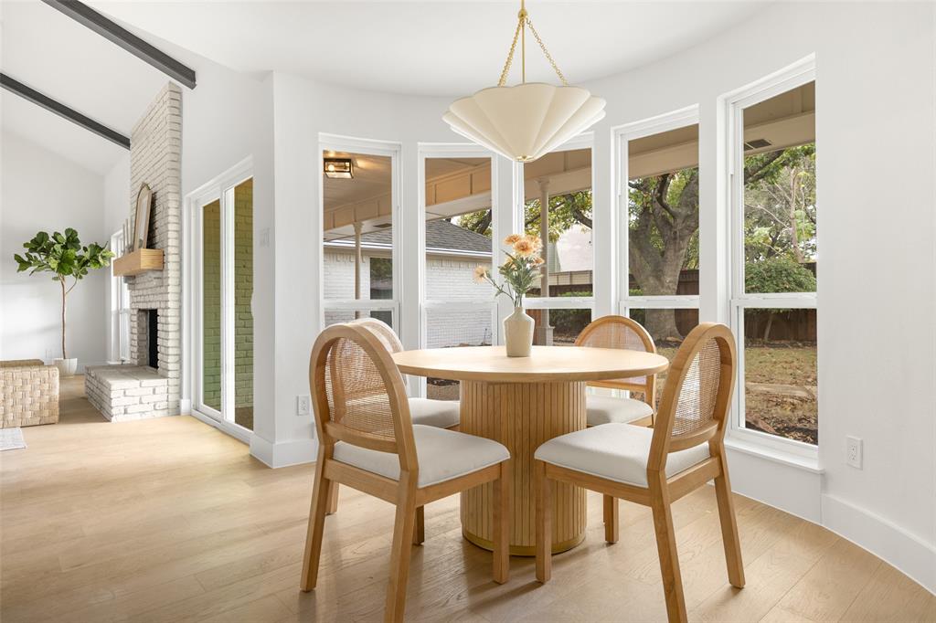 16805 Deer Park Drive Dallas, TX 75248 - Photo 16 of 39 a dining room with furniture and window