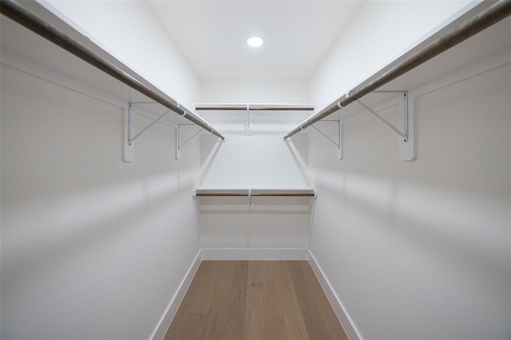 16805 Deer Park Drive Dallas, TX 75248 - Photo 22 of 39 a view of a hallway with staircase