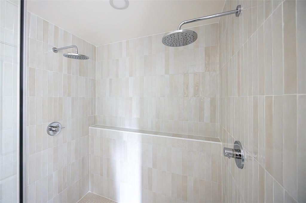 16805 Deer Park Drive Dallas, TX 75248 - Photo 28 of 39 a bathroom with a shower curtain