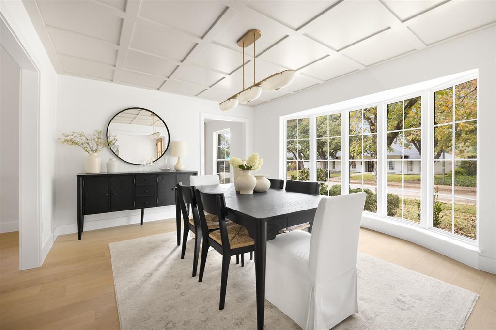 16805 Deer Park Drive Dallas, TX 75248 - Photo 3 of 39 a view of a dining room with furniture window and wooden floor