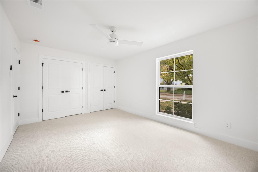 16805 Deer Park Drive Dallas, TX 75248 - Photo 31 of 39 an empty room with windows