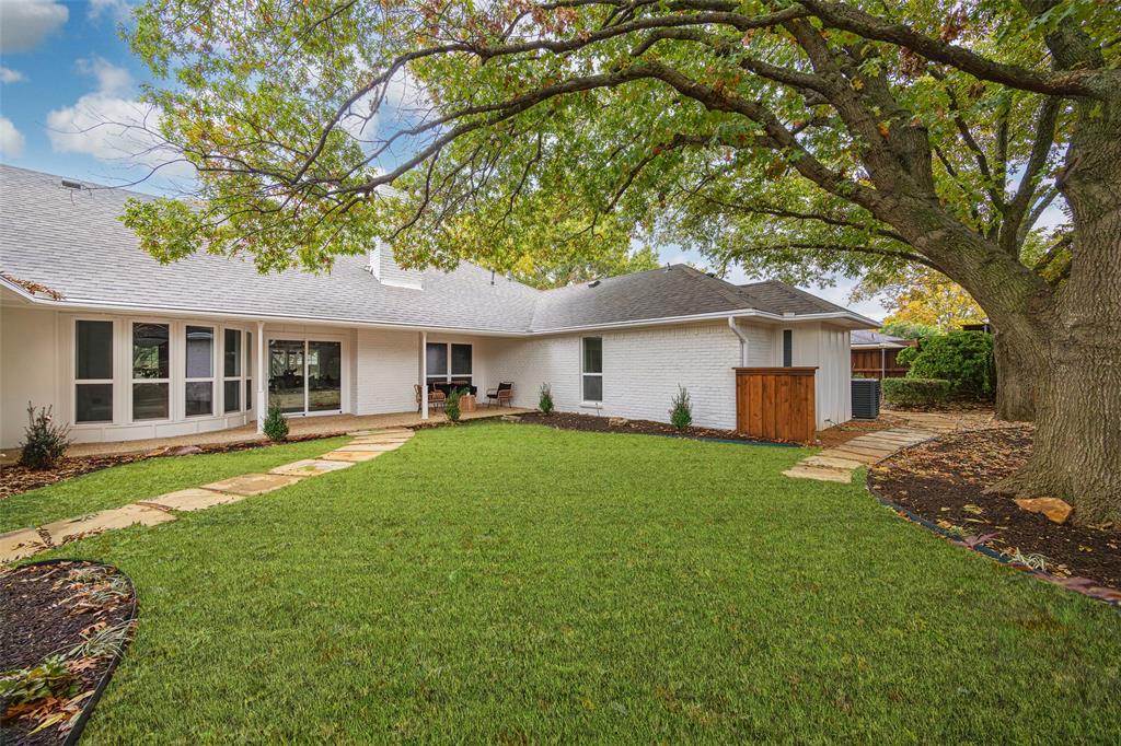 16805 Deer Park Drive Dallas, TX 75248 - Photo 39 of 39 a view of a yard with a house and a large tree