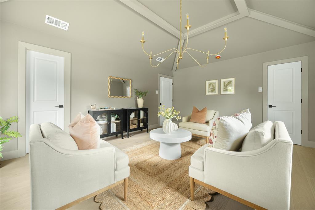 16805 Deer Park Drive Dallas, TX 75248 - Photo 4 of 39 a living room with furniture and a wooden floor