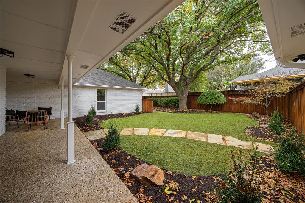 16805 Deer Park Drive Dallas, TX 75248 - Photo 5 of 39 a view of a house with a yard