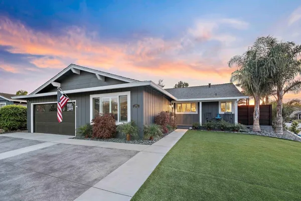front view of a house with a yard