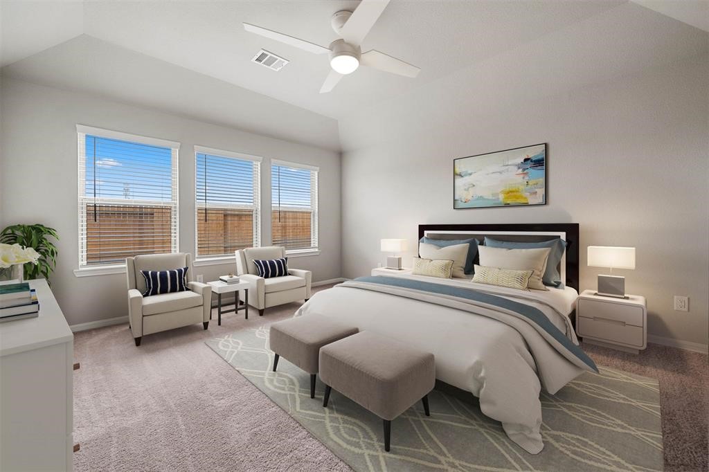 2103 Spring Hollow Drive Baytown, TX 77521 - Photo 12 of 27 a bedroom with furniture and a large window