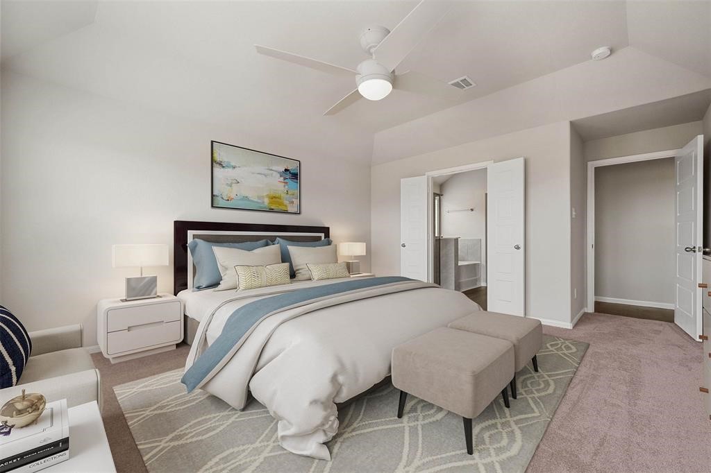 2103 Spring Hollow Drive Baytown, TX 77521 - Photo 13 of 27 a bedroom with a bed and a chandelier