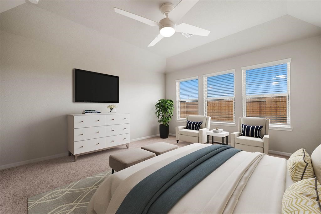 2103 Spring Hollow Drive Baytown, TX 77521 - Photo 15 of 27 a bedroom with furniture and a flat screen tv