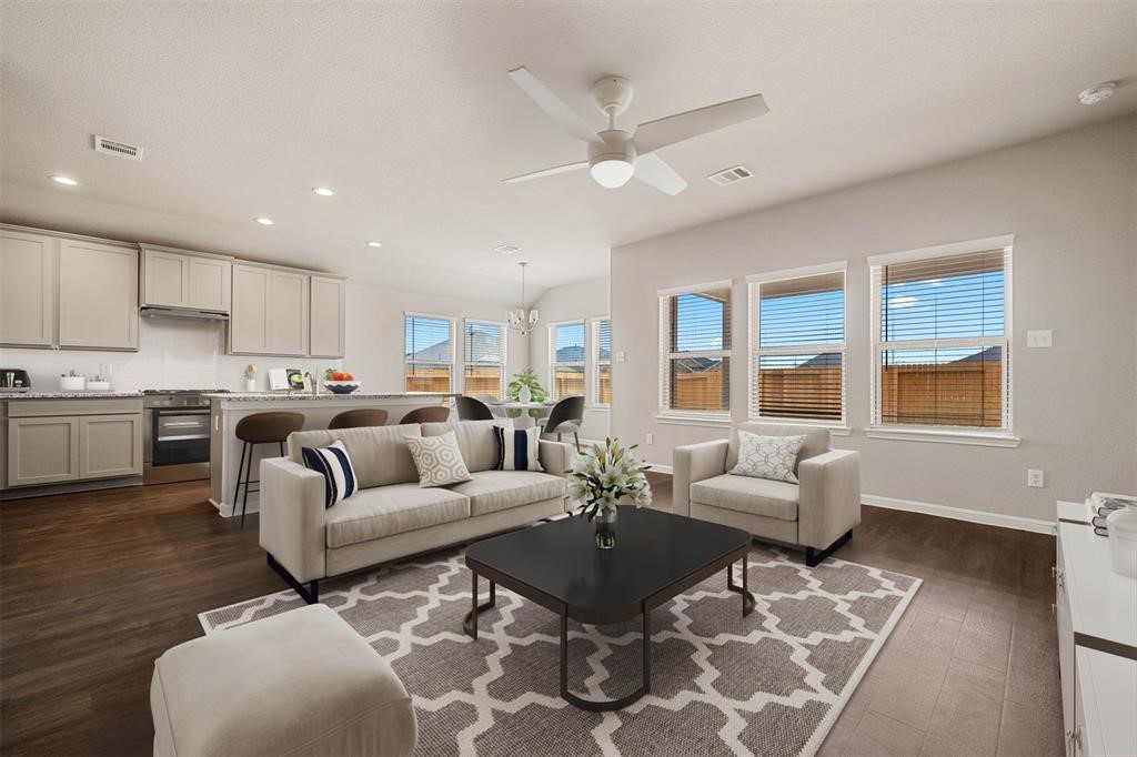2103 Spring Hollow Drive Baytown, TX 77521 - Photo 4 of 27 a living room with furniture and kitchen view