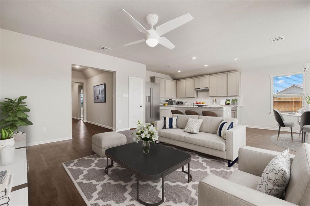 2103 Spring Hollow Drive Baytown, TX 77521 - Photo 6 of 27 a living room with furniture kitchen and a table