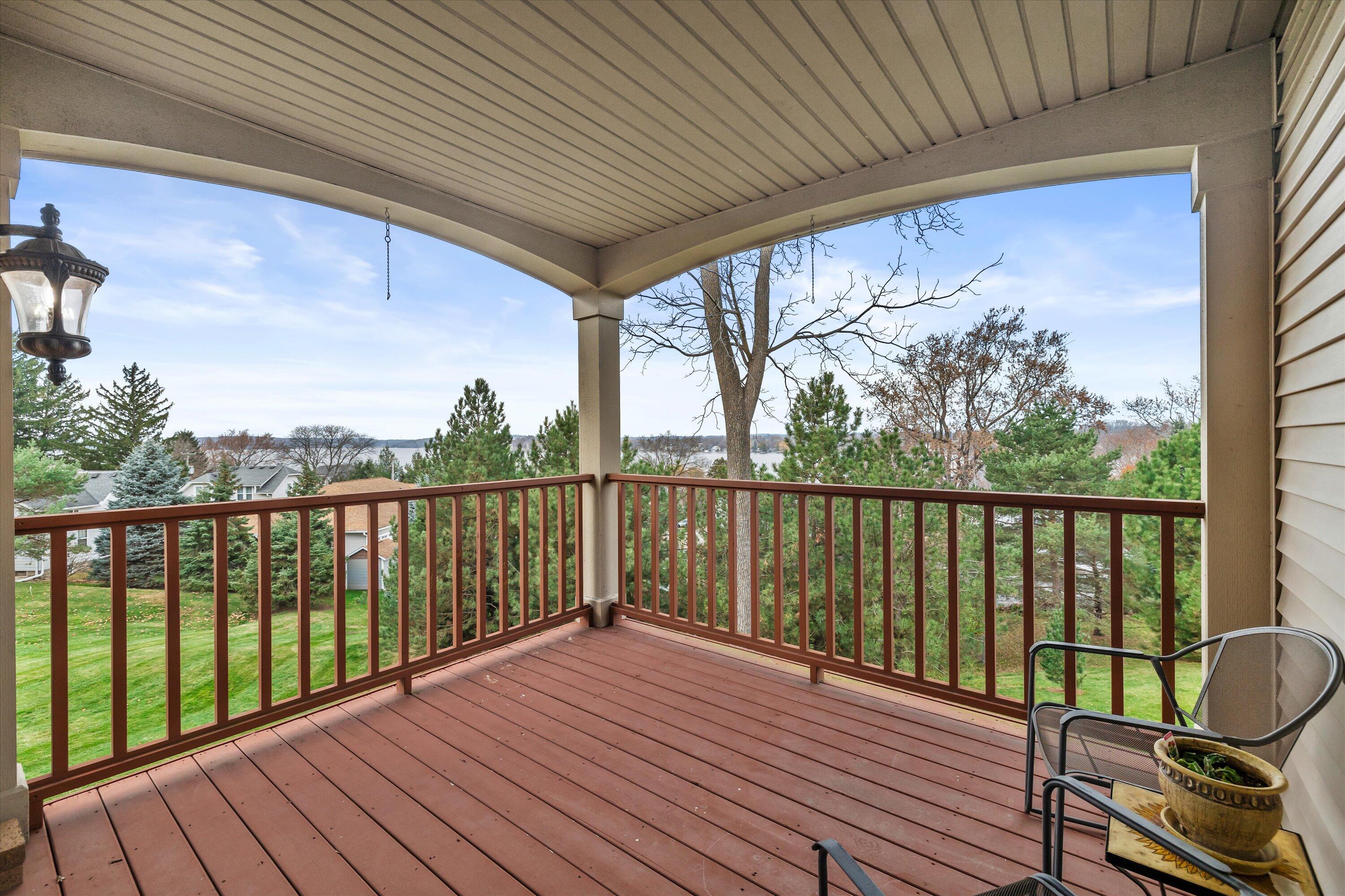 285 Cardinal Ridge Drive Pewaukee, WI 53072 - Photo 31 of 49 LL deck with views of Pewaukee Lake.