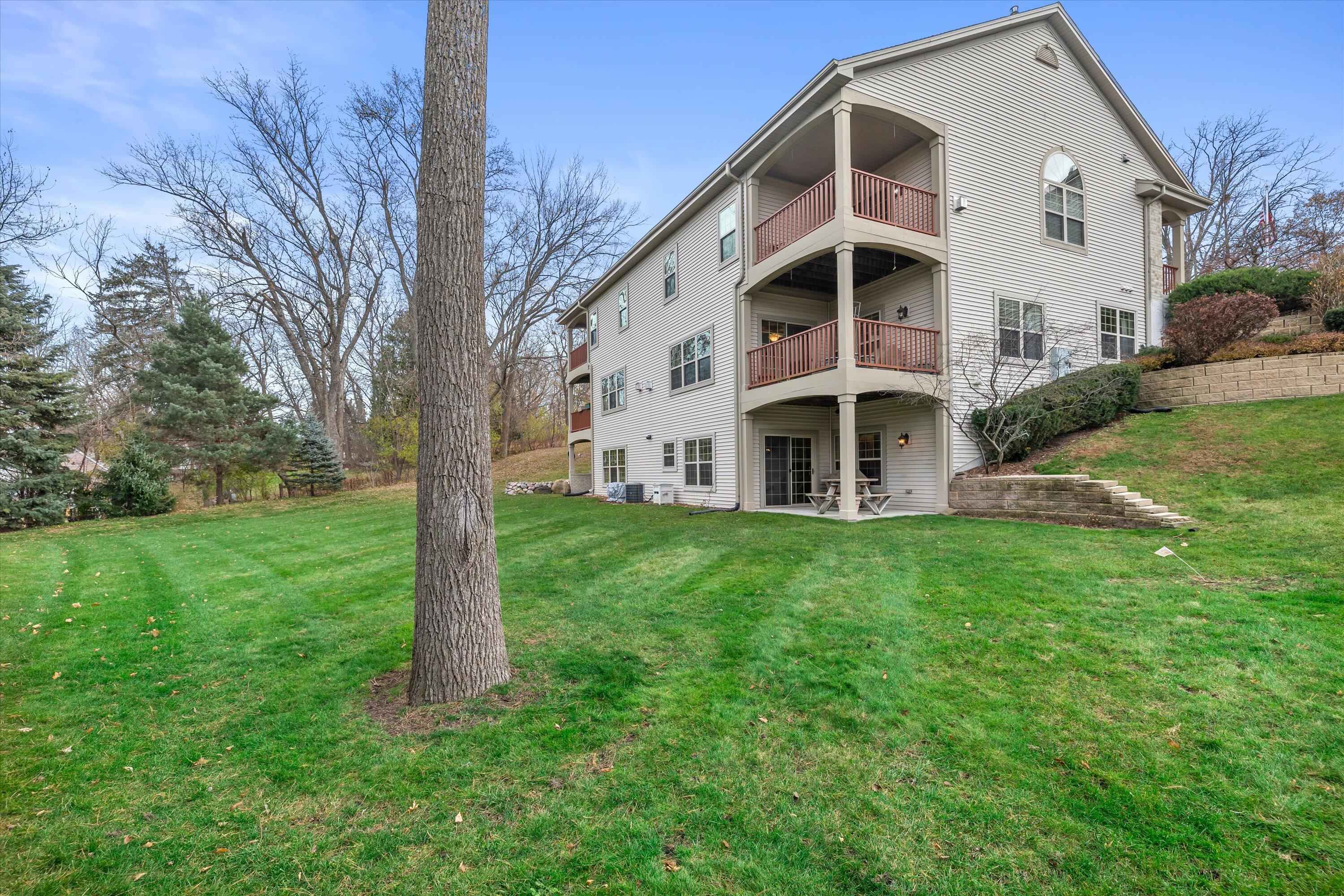285 Cardinal Ridge Drive Pewaukee, WI 53072 - Photo 45 of 49 Side Yard
