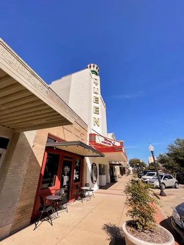 a view of a balcony with chairs