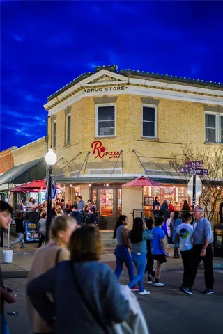 a view of street with shops