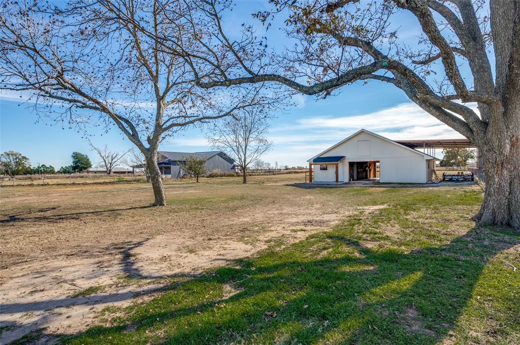 10422 Strittmatter Road Pilot Point, TX 76258 - Photo 22 of 30 a view of a house with a yard