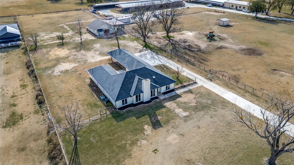 10422 Strittmatter Road Pilot Point, TX 76258 - Photo 26 of 30 a house with a yard