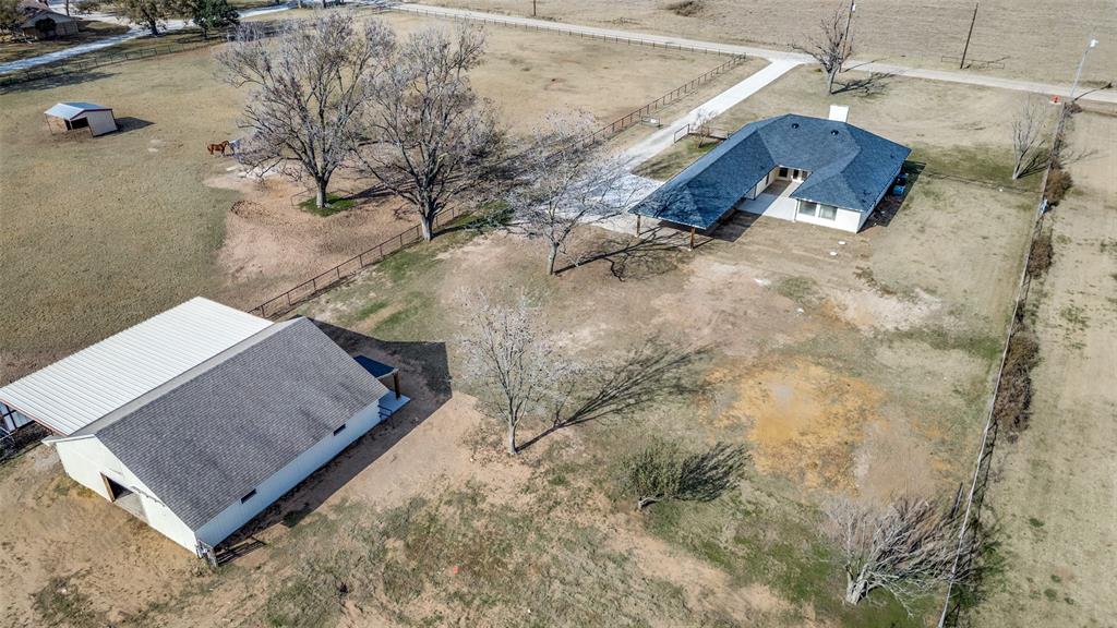 10422 Strittmatter Road Pilot Point, TX 76258 - Photo 27 of 30 view of a backyard