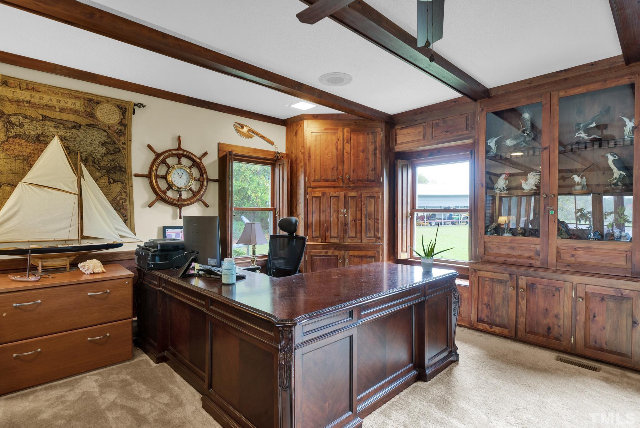 3614 Holly Grove Road Benson, NC 27504 - Photo 11 of 30 a kitchen with stainless steel appliances granite countertop a sink and a stove