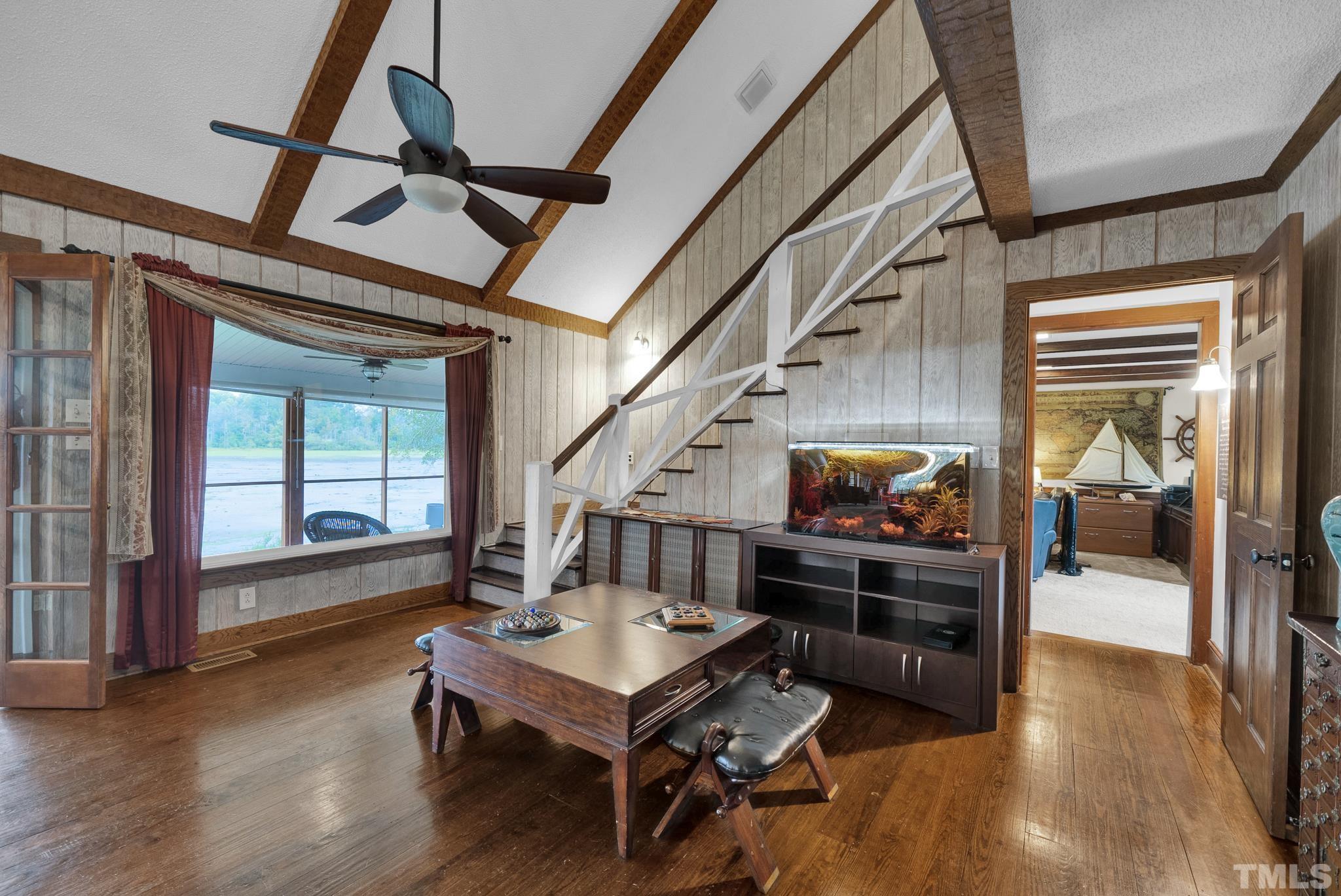 3614 Holly Grove Road Benson, NC 27504 - Photo 12 of 30 a living room with furniture and a wooden floor