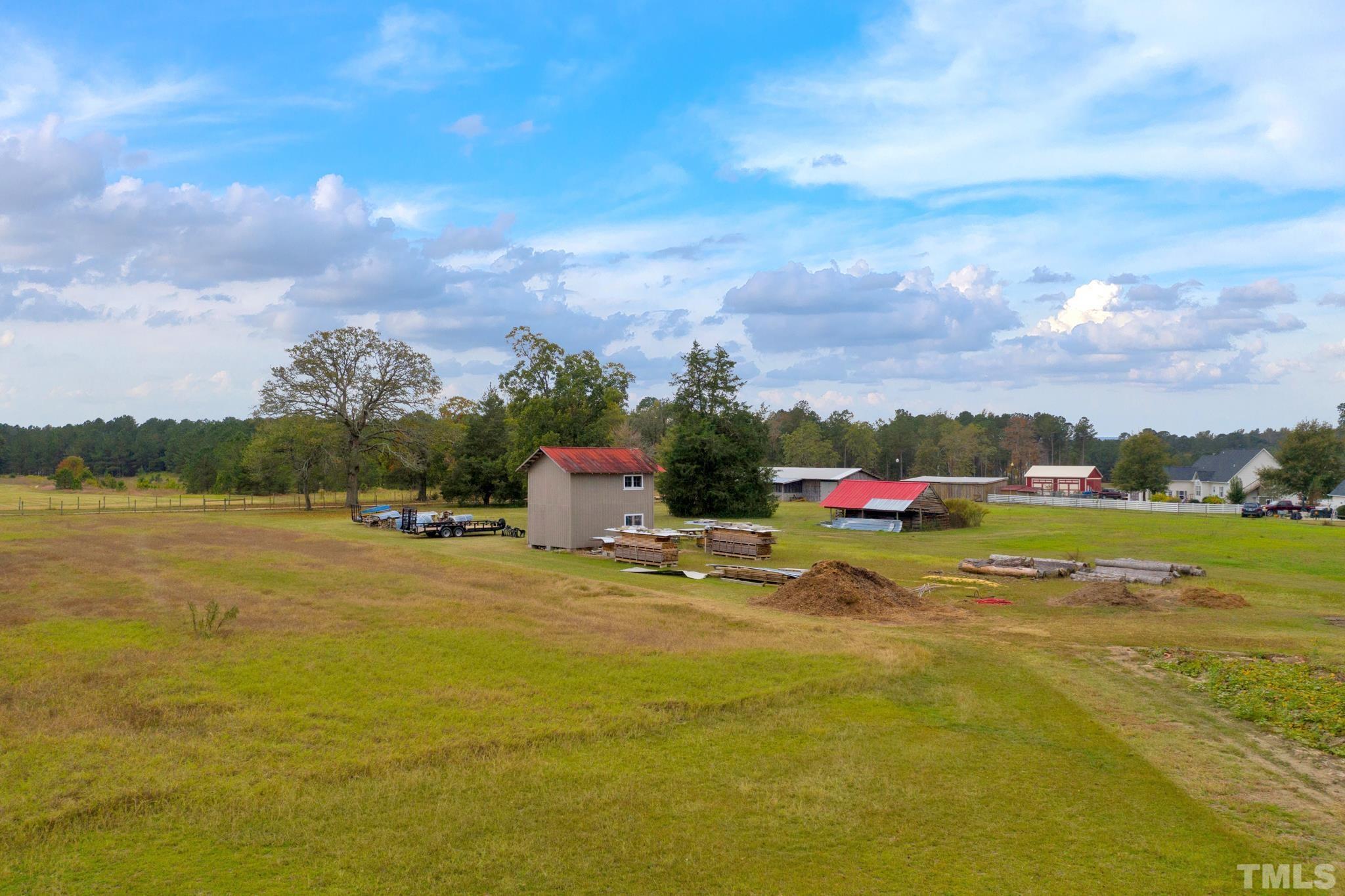 3614 Holly Grove Road Benson, NC 27504 - Photo 22 of 30 a view of a lake with houses