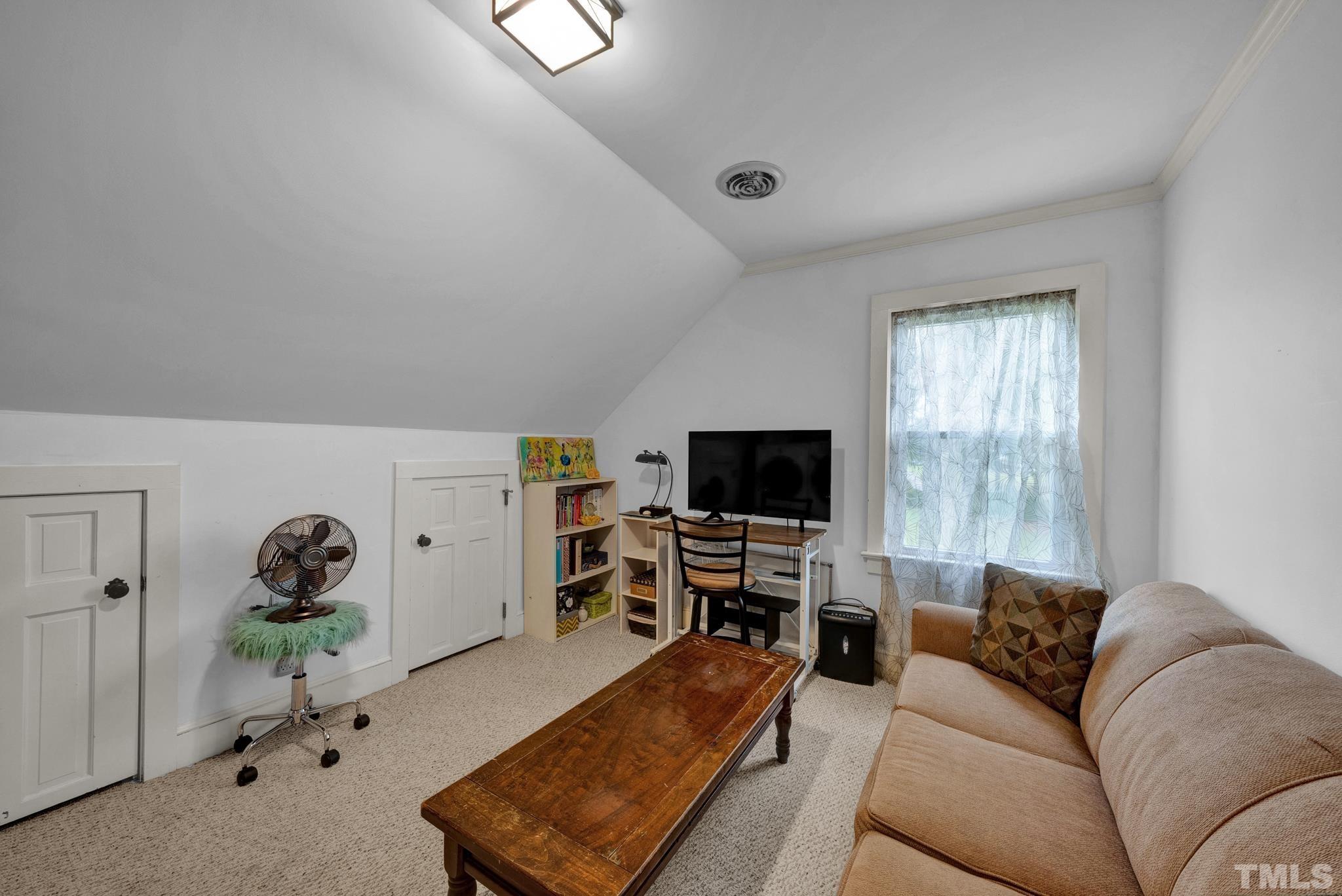 3614 Holly Grove Road Benson, NC 27504 - Photo 8 of 30 a living room with furniture and a flat screen tv