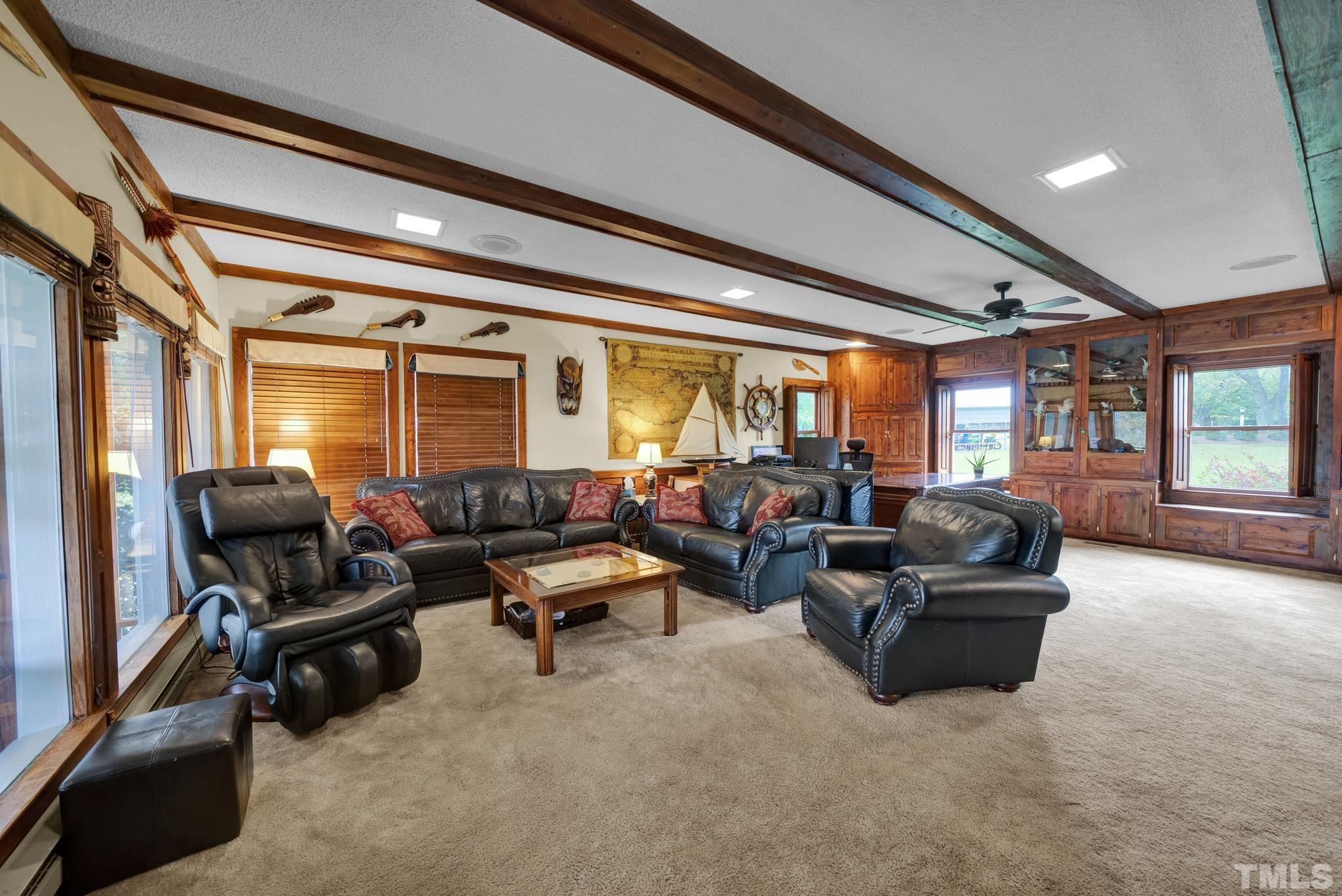 3614 Holly Grove Road Benson, NC 27504 - Photo 10 of 30 a living room with furniture and a window