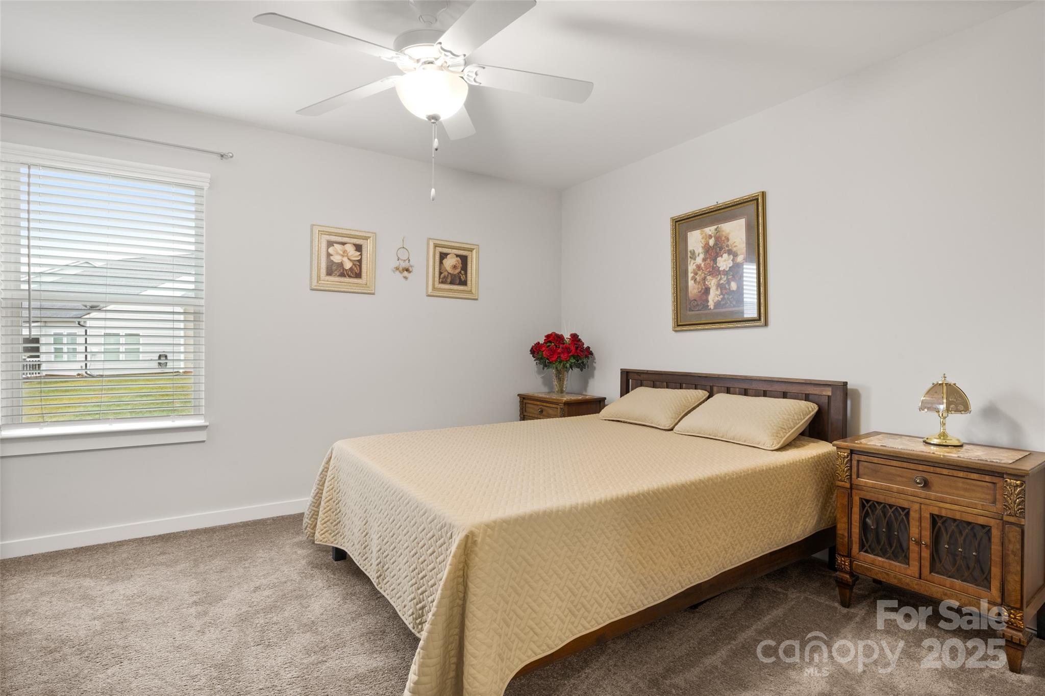 23115 Goose Down Lane Lancaster, SC 29720 - Photo 21 of 45 a bedroom with a bed and a chandelier