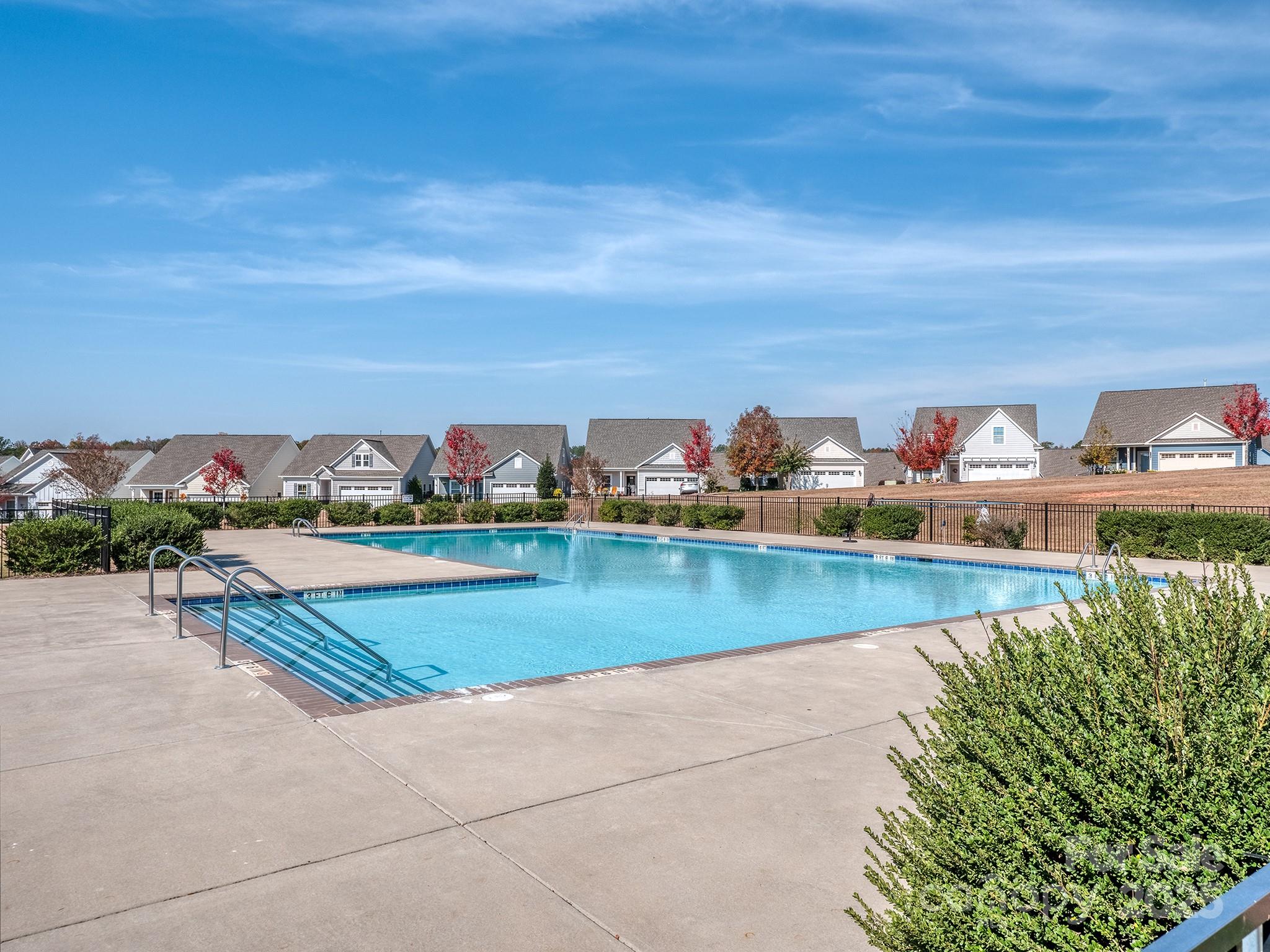 23115 Goose Down Lane Lancaster, SC 29720 - Photo 32 of 45 a view of swimming pool with outdoor seating and yard in back