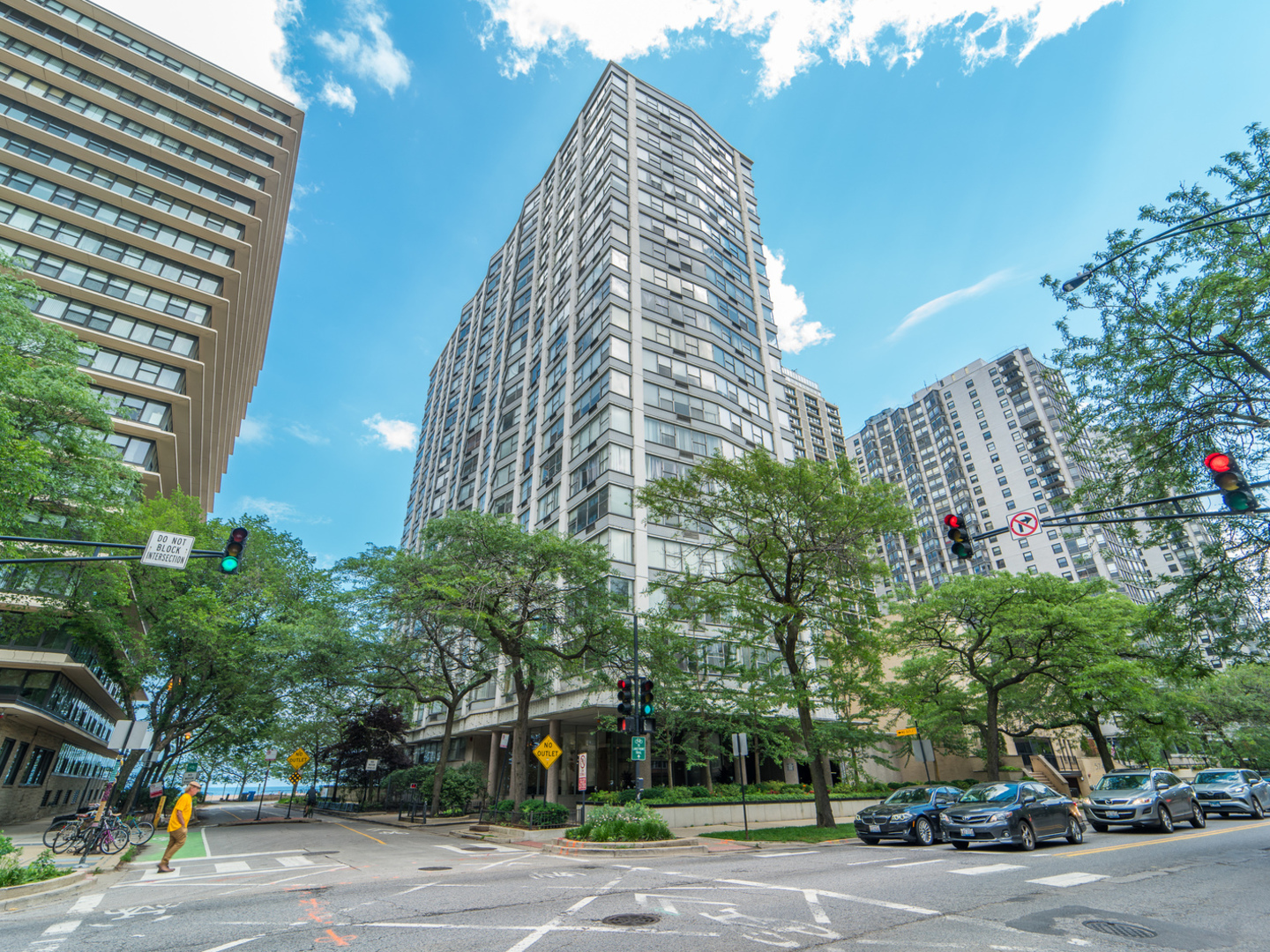 5757 North Sheridan Road, Unit 20F Chicago, IL 60660 - Photo 1 of 35 a view of a city street lined with tall buildings