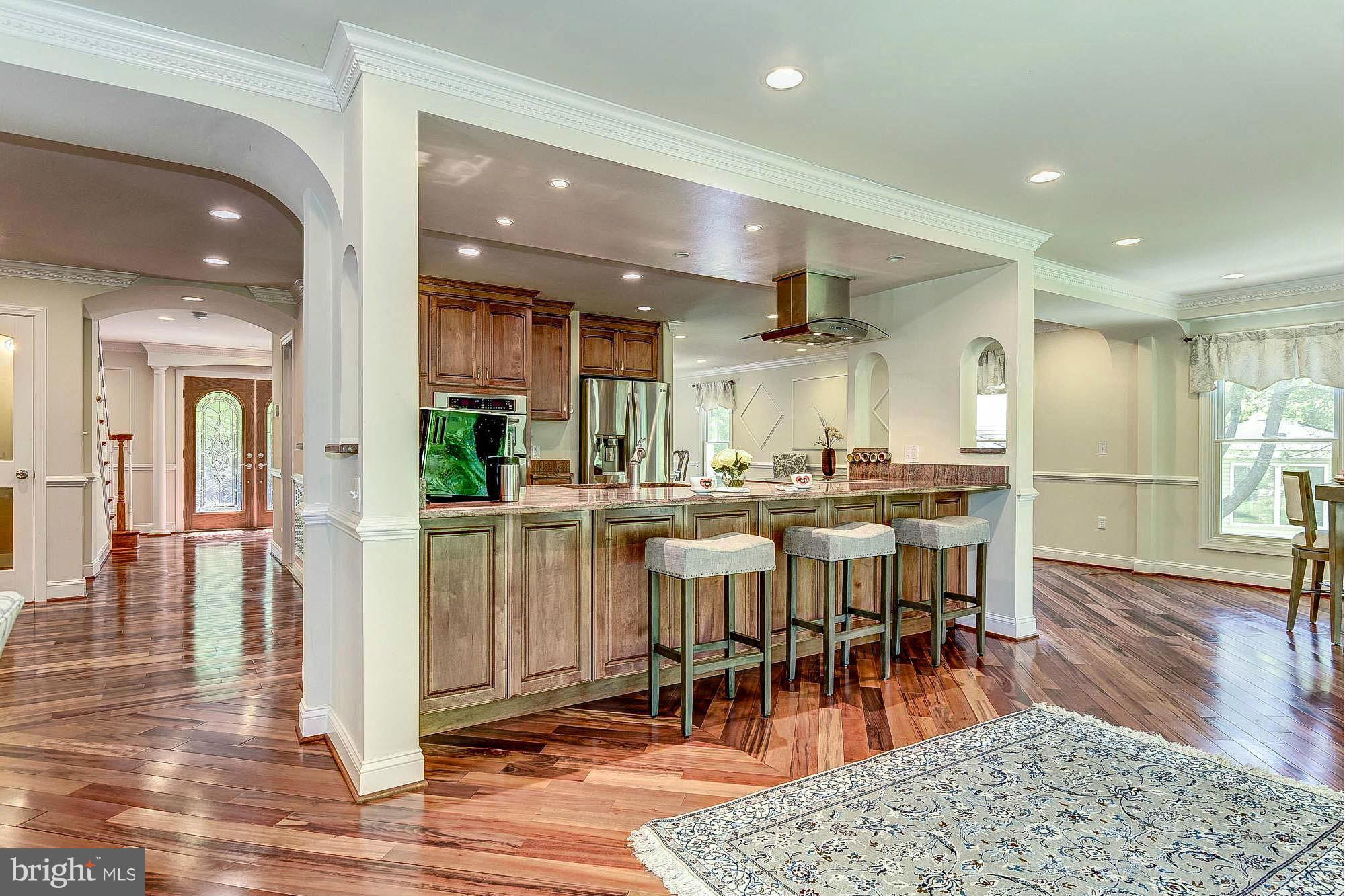 1523 Blue Meadow Road Potomac, MD 20854 - Photo 11 of 29 Open Island Kitchen with Abundant Cabinetry