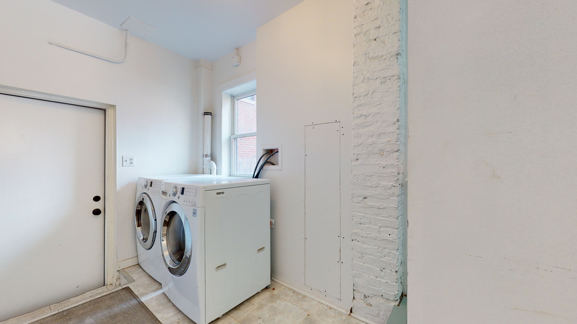 1543 West George Street, Unit 1 Chicago, IL 60657 - Photo 16 of 18 a utility room with dryer and washer