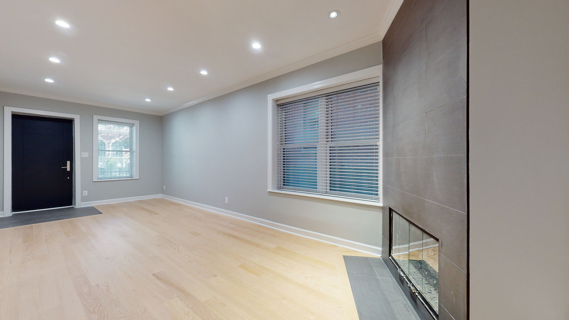 1543 West George Street, Unit 1 Chicago, IL 60657 - Photo 5 of 18 a view of an empty room with a window