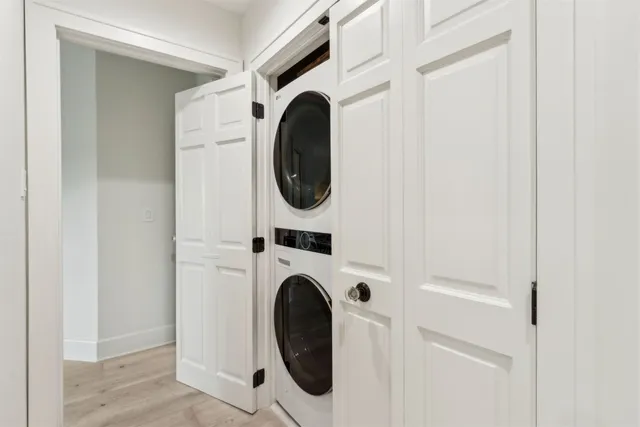 a view of a lake with a house in the background