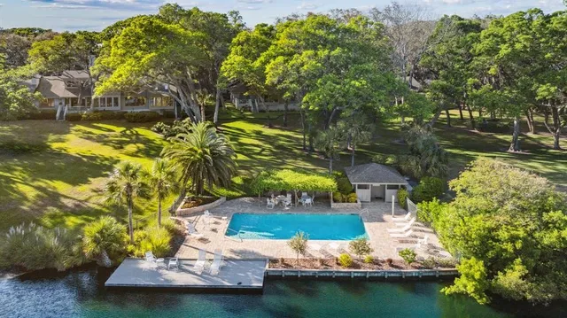 a view of a lake with a big yard