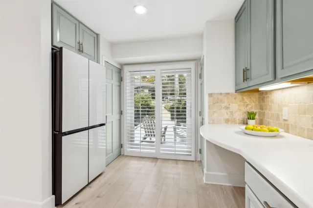 a view of a balcony with furniture